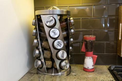 a coffee maker sitting on a counter in a kitchen at Feel At Home In MV - 'Good Vibes Only' Mentality in Mission Viejo