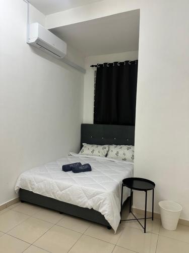 Katil atau katil-katil dalam bilik di Aman Homestay Sendayan