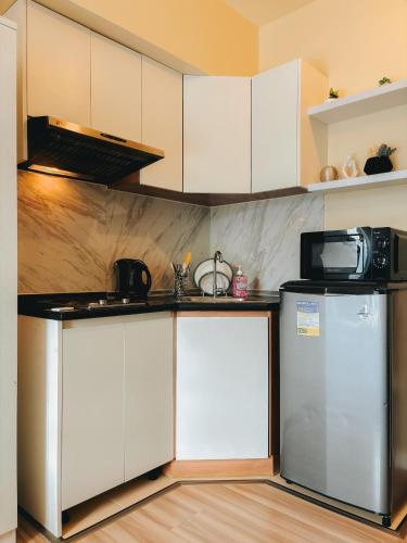 Kuchyň nebo kuchyňský kout v ubytování Virgo Nest Rentals - Avida Riala IT Park - City View