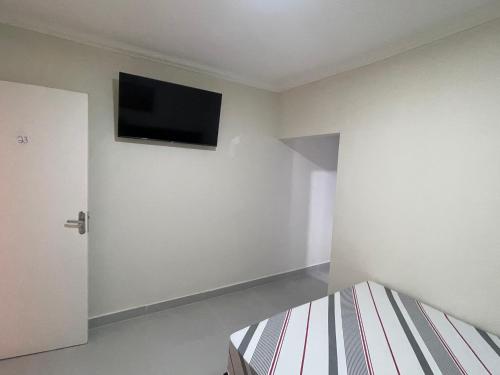 TV a/nebo společenská místnost v ubytování Hotel Belenzinho