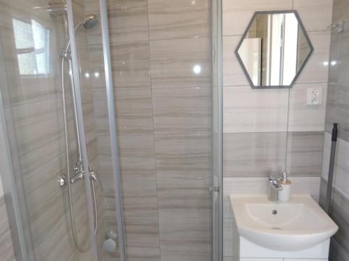 a bathroom with a shower and a sink at New holiday home for 5 people in Wise ka in Wisełka