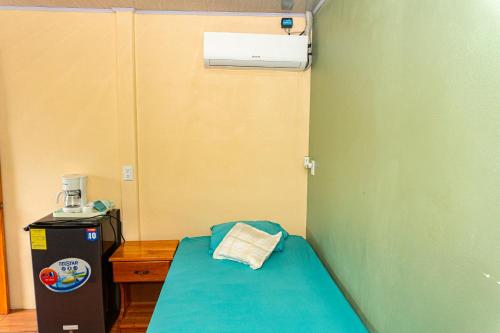 Katil atau katil-katil dalam bilik di Hotel Casa Gitana Corcovado Tour operador