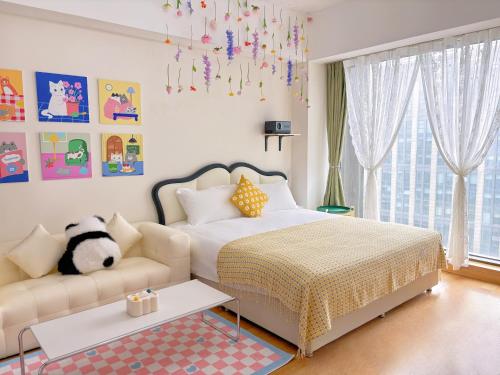 Katil atau katil-katil dalam bilik di Azure Haven Seaview Suites Shilaoren Coast