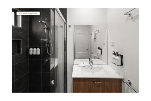 a bathroom with a sink and a shower at Discovery Parks - Clare in Clare