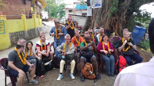 a group of people wearing bandanas posing for a picture at Laxmi Homestay in Tānsing