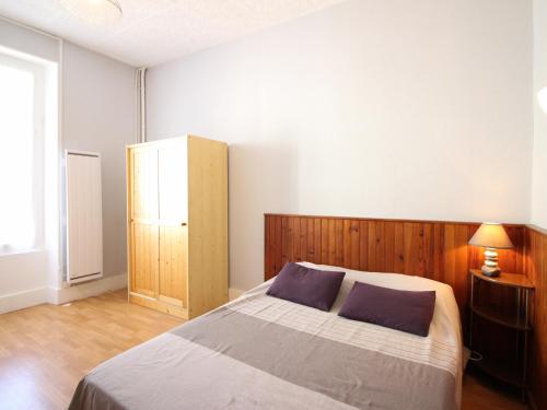 Posteľ alebo postele v izbe v ubytovaní Bel F2 avec terrasse, jardinet et cave - Mont-Dore centre - FR-1-415-138