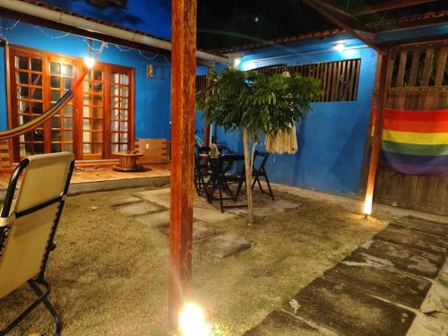 a room with a rainbow projected on the wall at Chalé Azul na Praia do Paraíso in Belém