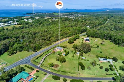 an aerial view of a park with a street light at Ocean Views on Acres - Diamond Beach in Diamond Beach
