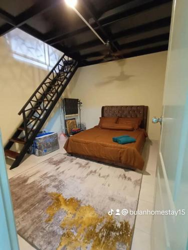 a bedroom with a large bed and a staircase at BULAN Homestay Melaka in Malacca