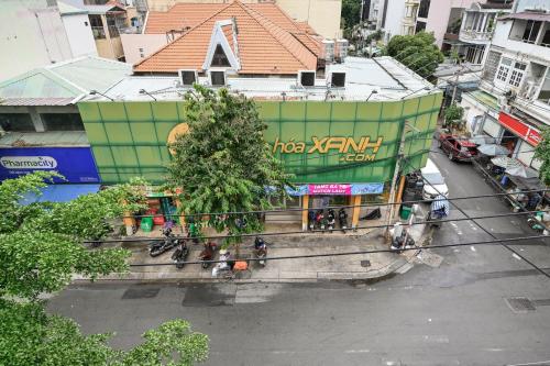 an overhead view of a street with people on motorcycles at Sunshine Airport Hotel in Ho Chi Minh City