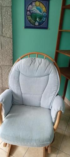 a chair with a blanket on top of it at Lakeview Villa Santiago 2 in Santiago Atitlán