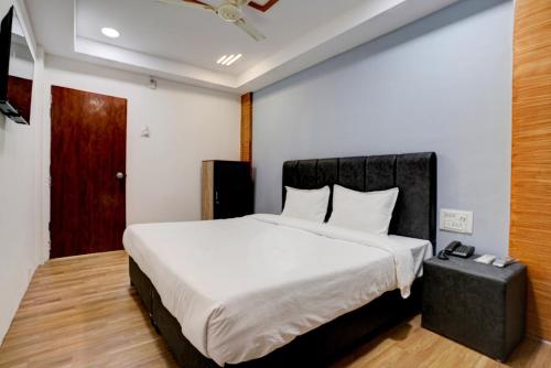Katil atau katil-katil dalam bilik di Hotel O Honey Inn