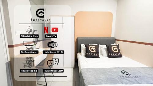 Postel nebo postele na pokoji v ubytování NeuSuite Cozy Studio by GUESTONIC