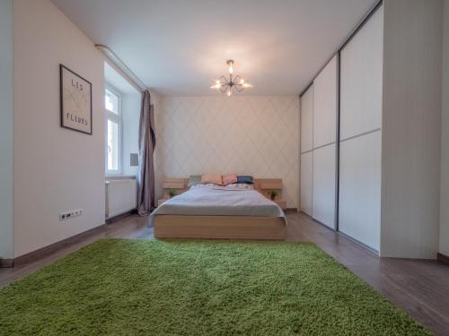 En eller flere senge i et værelse på Gorgeous apartment in center