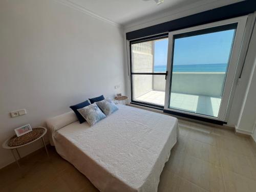 Ένα ή περισσότερα κρεβάτια σε δωμάτιο στο Duplex Terraza de Zoraida
