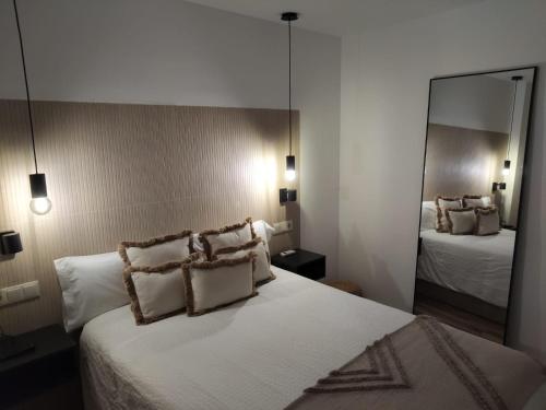 Postel nebo postele na pokoji v ubytování EL REFUGIO DE CARMEN 1 B