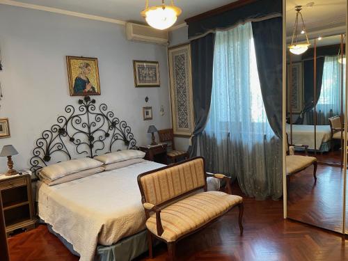 Postel nebo postele na pokoji v ubytování B&B Les Fleurettes
