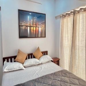 Katil atau katil-katil dalam bilik di Powai Valley Ventures LLP