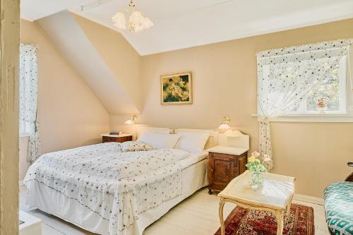 Ένα ή περισσότερα κρεβάτια σε δωμάτιο στο Visnes Hotel Stryn