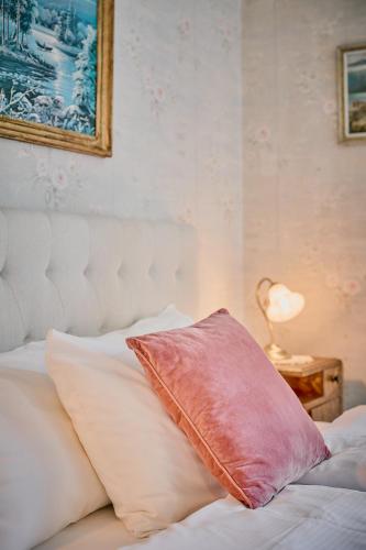 Ένα ή περισσότερα κρεβάτια σε δωμάτιο στο Visnes Hotel Stryn