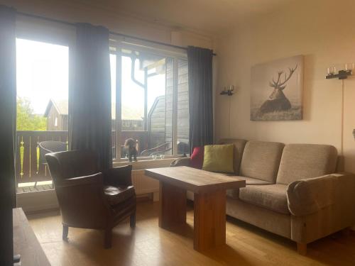 Et opholdsområde på Sentral, Hc-Friendly Apartment