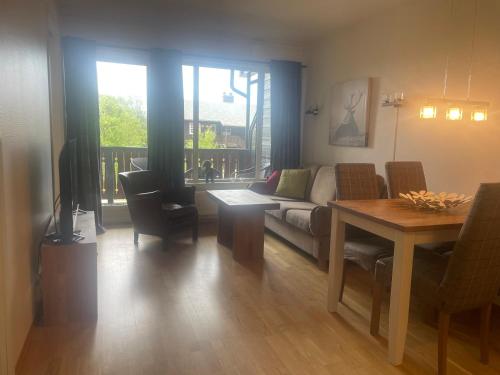 Et opholdsområde på Sentral, Hc-Friendly Apartment