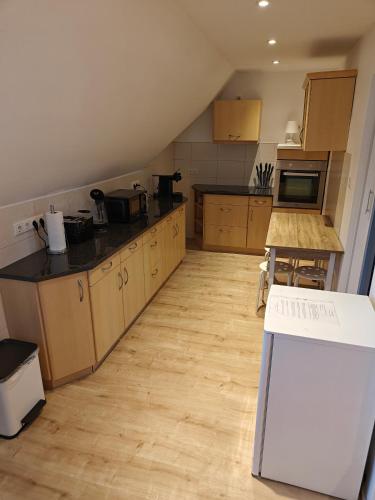 Kuchyň nebo kuchyňský kout v ubytování Ferienwohnung in Kleinstadt nähe Spreewald