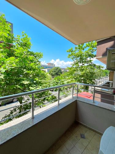 a balcony with a view of the street at Salt Lake Studio in Pomorie