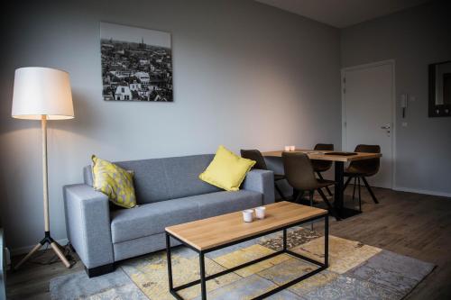 Zona d'estar a UtrechtCityApartments – Huizingalaan