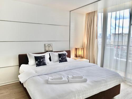 Ένα ή περισσότερα κρεβάτια σε δωμάτιο στο Sathorn Prime Residence 1BR #Bangkok