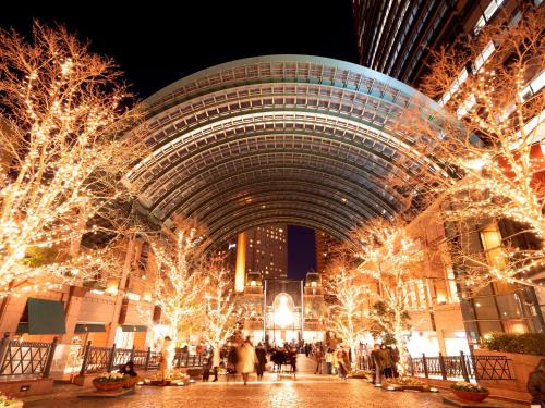a building with christmas lights in a city at night at illi Lay Shibuya-Ebisu in Tokyo