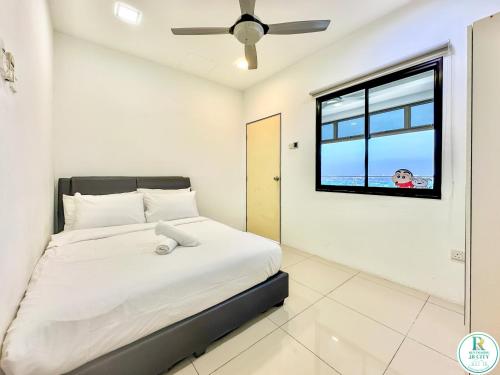 Postel nebo postele na pokoji v ubytování Palazio Serviced Apartments by RR JBcity