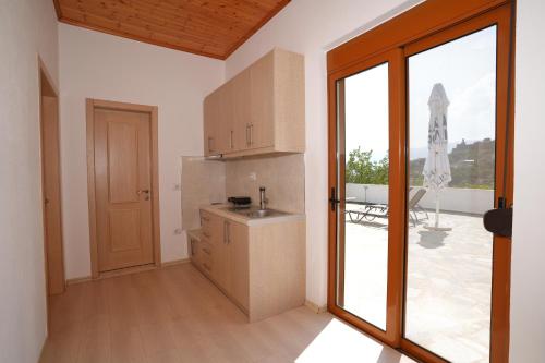 Kuchyň nebo kuchyňský kout v ubytování Jons Apartment