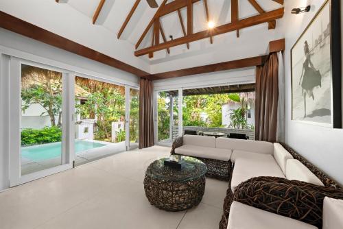 Postel nebo postele na pokoji v ubytování Zara Beach Resort Koh Samui
