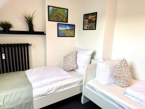 Una cama o camas en una habitación de RiversideMosel Neumagen