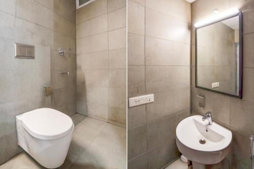 a bathroom with a toilet and a sink at Super Townhouse Gomti Nagar Sector 6 Near Ekana Stadium in Lucknow