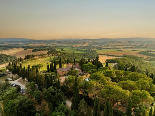 an aerial view of a estate with cypress trees at Agriturismo Pieve Sprenna in Buonconvento