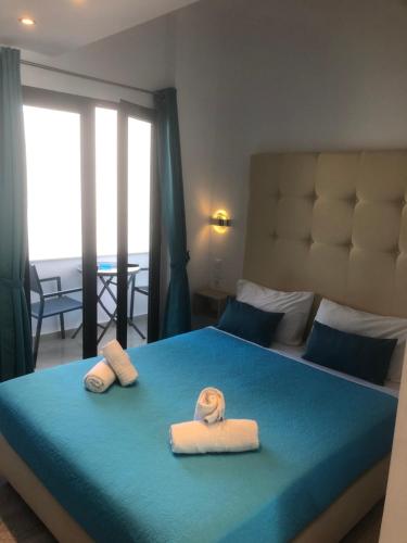 Postel nebo postele na pokoji v ubytování Rethymno Hills Apartments