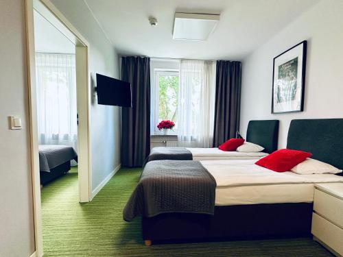 Posteľ alebo postele v izbe v ubytovaní B&B Julinek Park