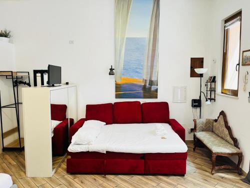 Ένα ή περισσότερα κρεβάτια σε δωμάτιο στο Holidays in Rome at Luigi's - Trastevere