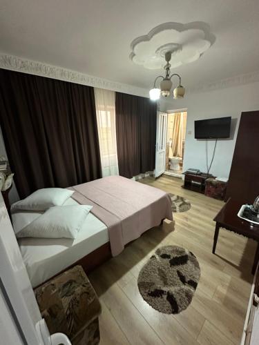 Ένα ή περισσότερα κρεβάτια σε δωμάτιο στο Motel Orion