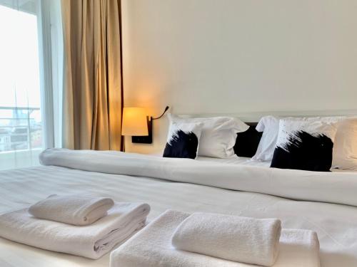 Ένα ή περισσότερα κρεβάτια σε δωμάτιο στο Sathorn Prime Residence 1BR #Bangkok
