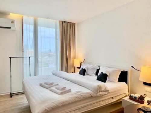 Ένα ή περισσότερα κρεβάτια σε δωμάτιο στο Sathorn Prime Residence 1BR #Bangkok