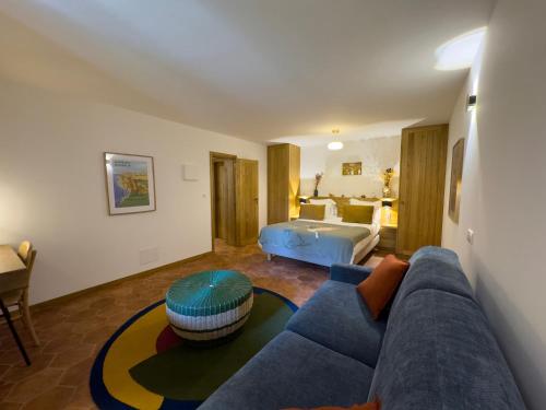 Кровать или кровати в номере Domaine Pozzo di Mastri hôtel & spa