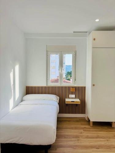 Postel nebo postele na pokoji v ubytování Apartamento en Playa de Gandia