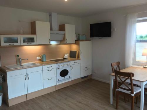 Kuchyň nebo kuchyňský kout v ubytování Ferienwohnung Apfelkiste