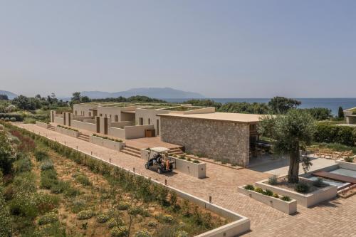 an overhead view of a building with plants and trees at Meraviglia Slow Living in Preveza