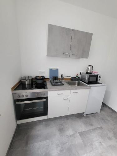 Η κουζίνα ή μικρή κουζίνα στο Ferienwohnung Obers