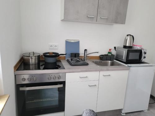 Η κουζίνα ή μικρή κουζίνα στο Ferienwohnung Obers