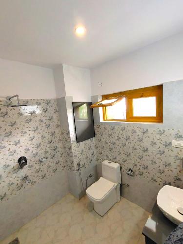 Ένα μπάνιο στο Royal Nangso Guest House